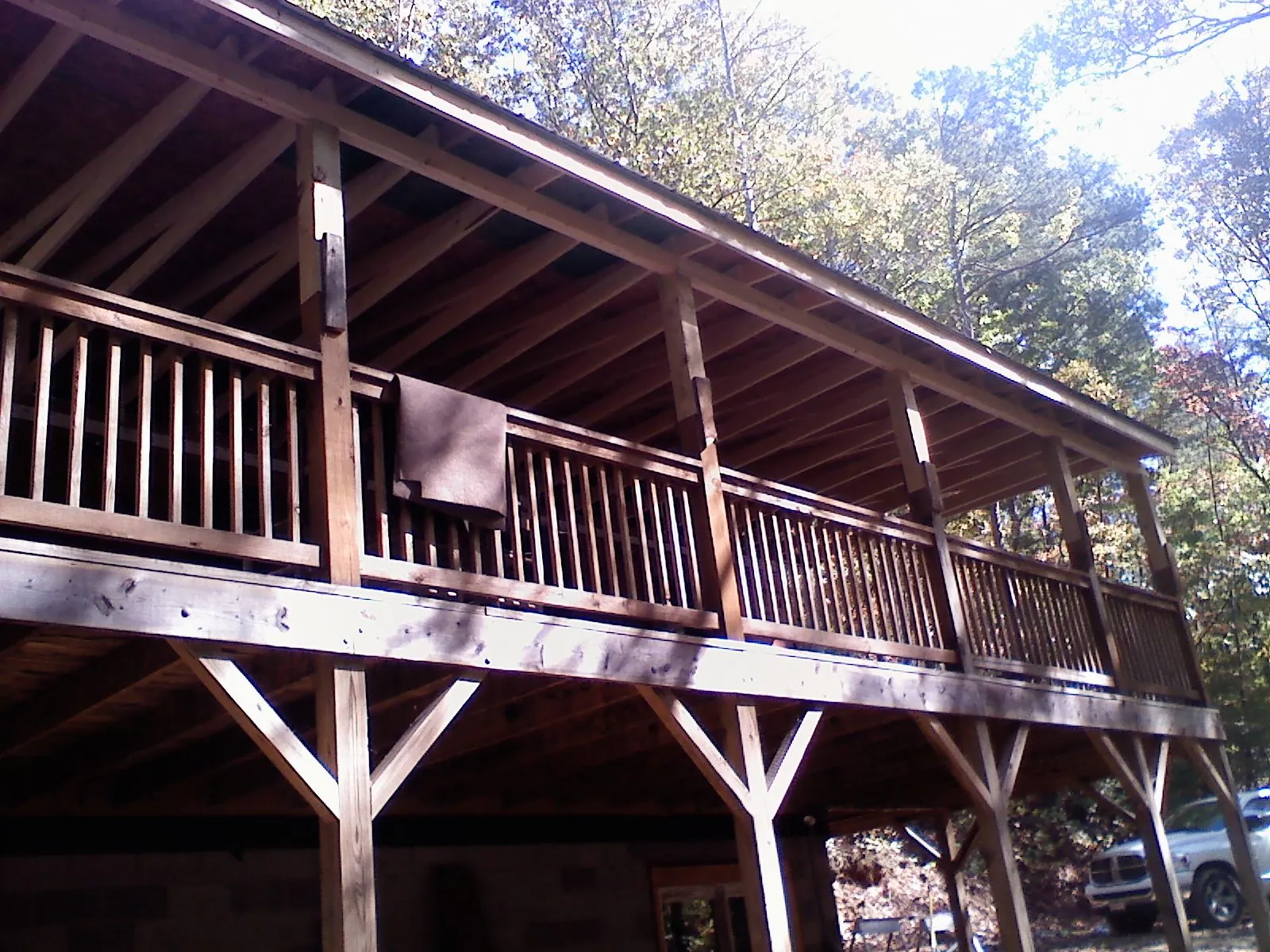 Timber framing under a new elevated porch and deck — Roof Leak Repair in Sloan by Roofing Brothers